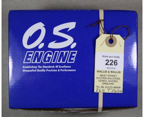 O.S. model aircraft engine for radio controlled aircraft. Model No. MAX 55AX /15610, complete with silencer and Instructions.