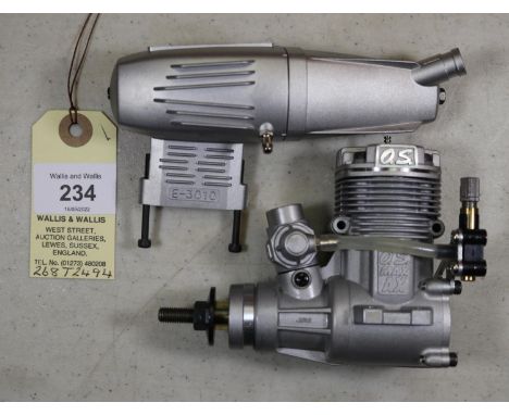 O.S. model aircraft engine for radio controlled aircraft. Model No. MAX 46AX /15480, complete with silencer. Made in Japan 19