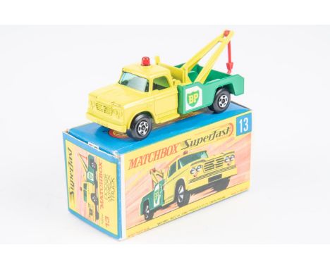 Matchbox Superfast. 13 Dodge Wreck Truck, with yellow cab, green back, green glazing, red light to roof, red plastic hook. Bo