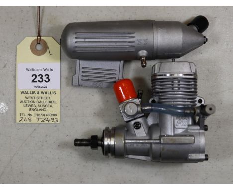 O.S. model aircraft engine for radio controlled aircraft. Model No. MAX 25FX /12660, complete with silencer. Made in Japan 19