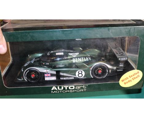 5x diecast cars by various makes. An Auto Art Motorsport 1:18 scale Bentley Speed 8 Le Mans 2003, 8, in BRG. Corgi 1:18 scale