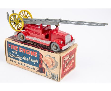 A modern toys Real scale model Fire Engine in die cast metal, finished in red, with solid metal wheels and  extending fire es