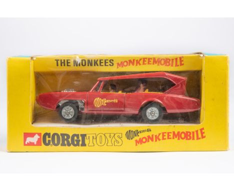 Corgi Toys Monkeemobile (277). The Monkees car in red and white with 4-figures. Boxed with inner tray, some wear/damage. Vehi