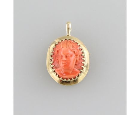Korallen-Kamee - Anhänger/BroscheGelbgold 14kt. und lackrote Koralle geschnitten, ovale Koralle mit plastischem Portrait eine