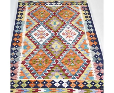 A Persian kilim, with hooked coloured diamonds, 158 x 103cm