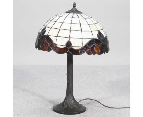 A Tiffany style table lamp and shade