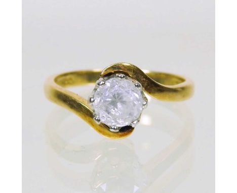 An 18 carat gold diamond solitaire ring, of bypass design, approximately 0.85 carats, 4g, size M/N