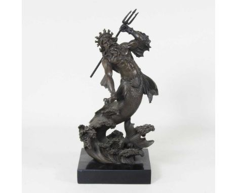 A bronze figure of Poseidon/Neptune, holding a trident, on a marble base, 35cm high