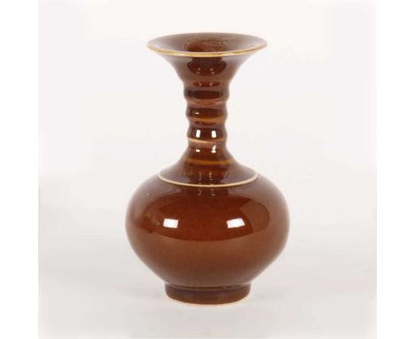 A Chinese brown glazed porcelain vase, having a flared rim, six character mark to the underside, 15cm highOverall condition i