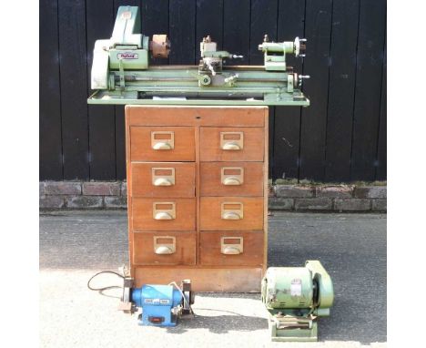 A Myford electric lathe, together with an oak stand, fitted with drawers and two workshop tools (4)96w x 41d x 41hcmOverall c