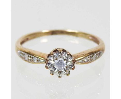 A 9 carat gold illusion set solitaire diamond ring, with diamond set shoulders, 1.4g, size K