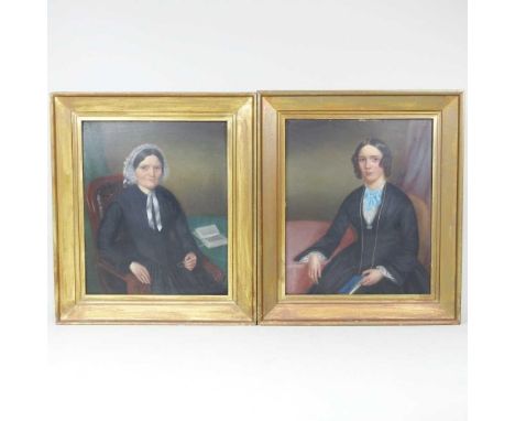 English school, 19th century, a half length portrait of a seated lady, oil on board, 30 x 24cm, together with another (2)