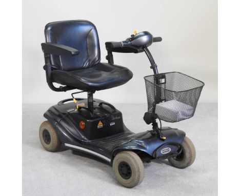 A Shoprider electric mobility scooter, with charger