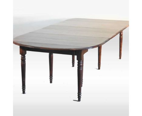 A fruitwood extending dining table, with six additional leaves, on turned legs300w x 134d x 79h cmOverall condition looks to 