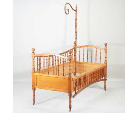 A Victorian faux bamboo child's cot, on castors168w x 77d x 182h cmOverall condition looks to be usable, but with signs of ag