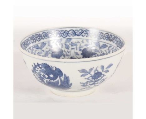 A Chinese blue and white porcelain bowl, decorated with birds and flowers, six character mark to the underside, 15cm diameter