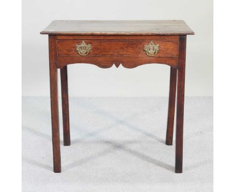 An 18th century oak side table, with a shaped apron72w x 45d x 72h cm