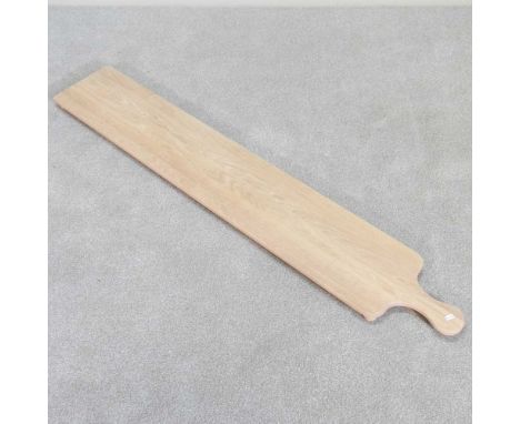 A large hand-made wooden meze serving platter, 150 x 25cm