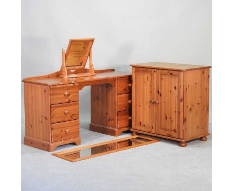A modern pine dressing table, together with a wall mirror, another and a side cabinet (4)