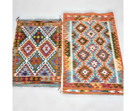 A Persian kilim, with rows of lozenges, 124 x 79cm, together with another smaller, 100 x 67cm (2)