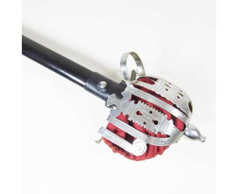 A replica broad sword, with a basket hilt and leather scabbard, 110cm long overall