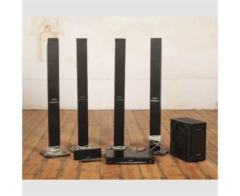 A Panasonic 5.1 home cinema kit, comprising four tallboy standing speakers, a centre speaker, a subwoofer, and a SA-PT860 CD/
