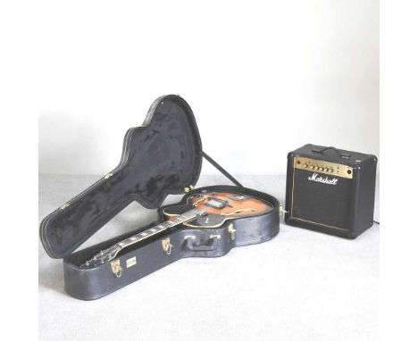 An Antoria Jazzstar semi acoustic guitar, in hard case, with a Marshall MG15CF amplifier (2)