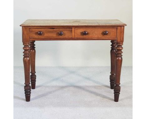 A Victorian mahogany side table, containing two short frieze drawers99w x 49d x 76h cm