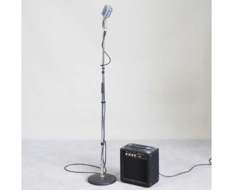 A Satrawal stage microphone, on stand, together with an Acoustic Solution JE21 amplifier, 28cm wide (2)
