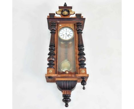 A 19th century walnut cased Vienna style wall clock, 112cm high