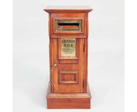 A wooden country house post box, modern, enclosed by a hinged door, 50cm high