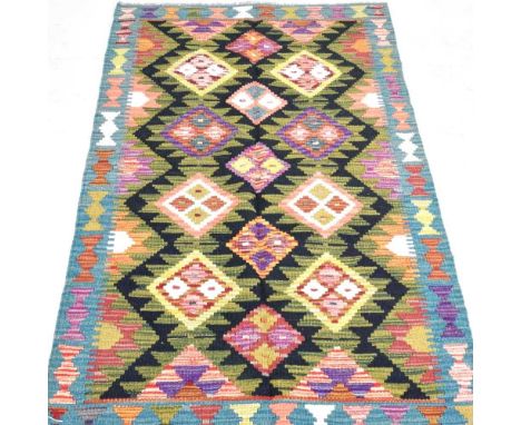 A Persian kilim, with all over diamonds, 160 x 97cm