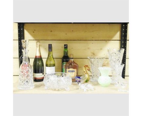 A collection of cut glass and bottles of alcohol, to include a bottle of Martell Cognac