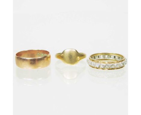 A 9 carat gold wedding band, 2.6g, size P, together with another, 1.8g, size K and a full eternity ring, size O (3)