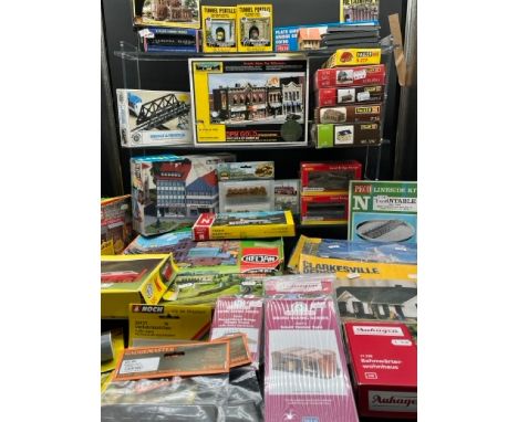 Job Lot of N gauge Track side and Scenic buildings, mostly un-built kits, also scenic items(5600g)Some kits have been previou