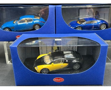 3 AUTOart Bugatti 1:43 models in boxes (700g)50904 Bugatti EB 16.4 Veyron Showcar (Black/Yellow)50911 Bugatti EB 18.3 Chiron 