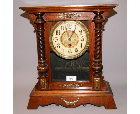 An American mahogany cased mantel clock with single glazed display door