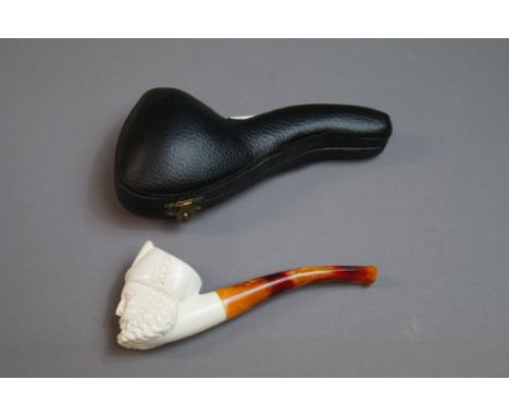 A contemporary cased carved meerschaum pipe, the bowl in the form of a Turk's head