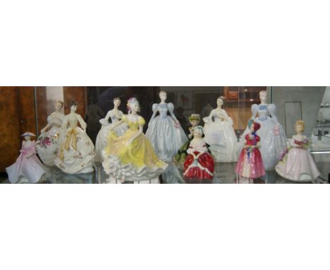 Ten ceramic figures by Royal Doulton, Royal Worcester and Coalport