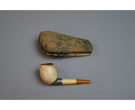 A cased meerschaum cased pipe, with amber mouthpiece and white-metal collar