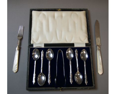 A Victorian silver and Mother-of-pearl knife and fork, together with a boxed set of silver-plated Apostle spoons