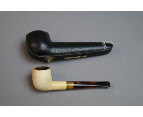 A cased meerschaum pipe