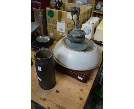 An old cast iron shell case, hanging light and cutlery box.