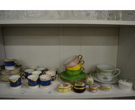 A quantity of coffee cans and saucers, Halcyon Days enamel boxes etc.