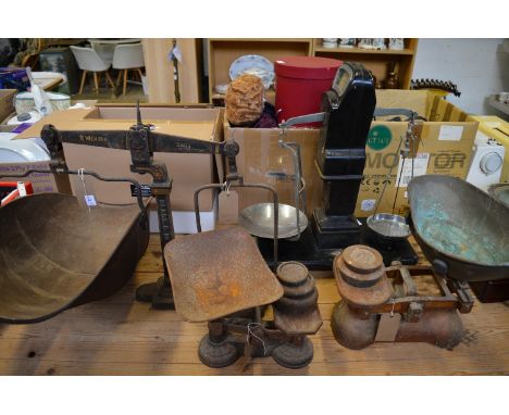 Old weighing scales and weights.