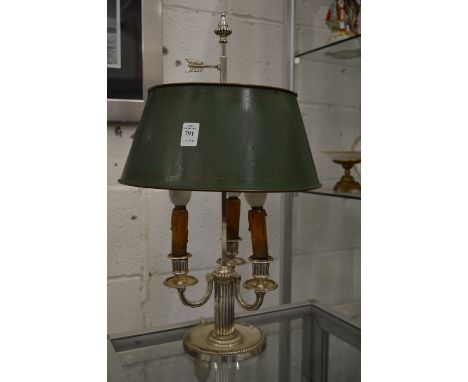 A silver plated three light table lamp with toleware shade.