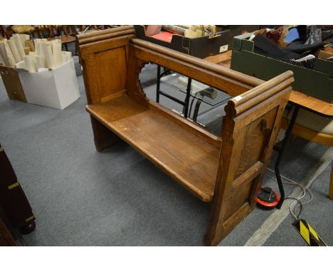 A Victorian oak pine pew.