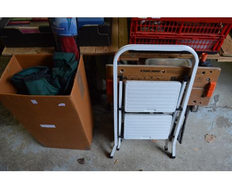 A step ladder, Workmate and other items.