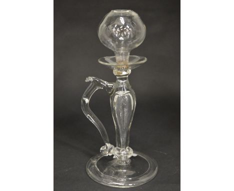 A 19th century blown glass night light (?).