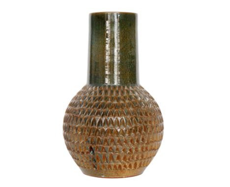 Jenny Haigh - Poole Pottery - An Atlantis vase of globe and shaft form, the ovoid body with a carved repeat triangle pattern,